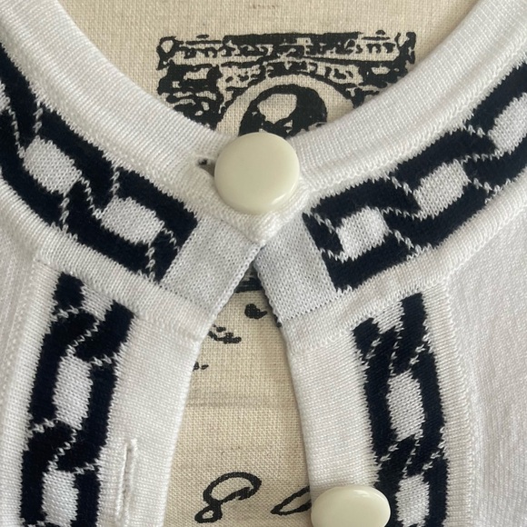 A lovely white with black trim cardigan sweater, short sleeve size medium - Picture 10 of 11